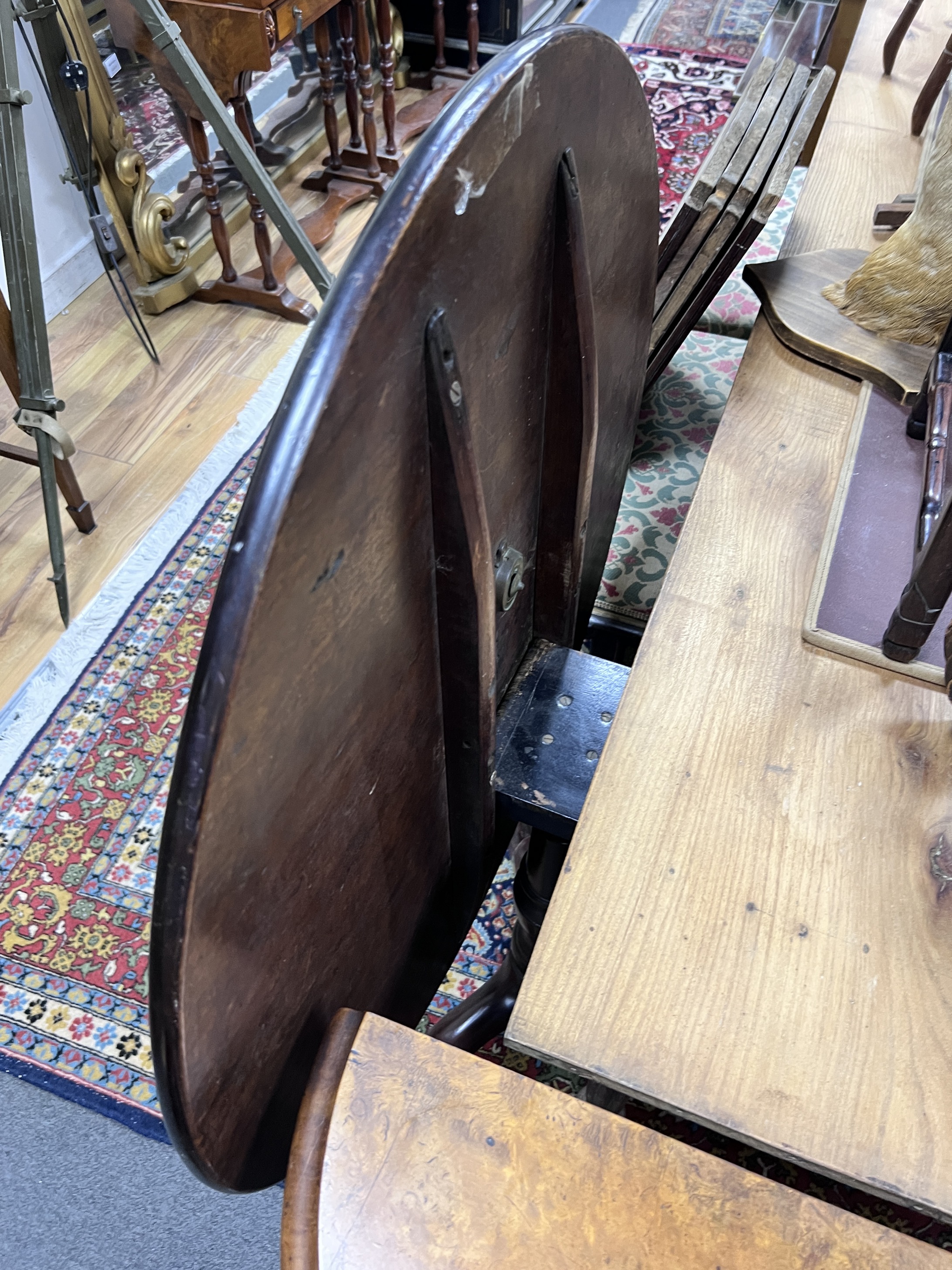 A George III mahogany tilt top tea table with tripod base, diameter 76cm